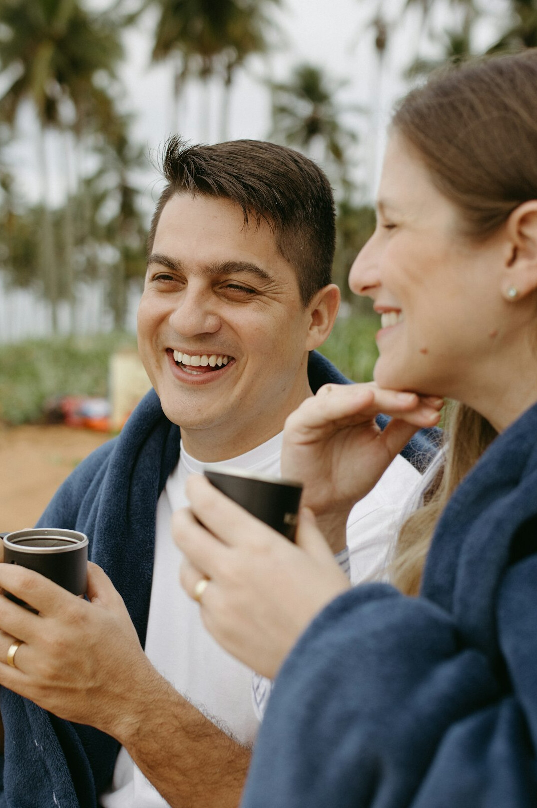 Two people having a warm conversation over coffee