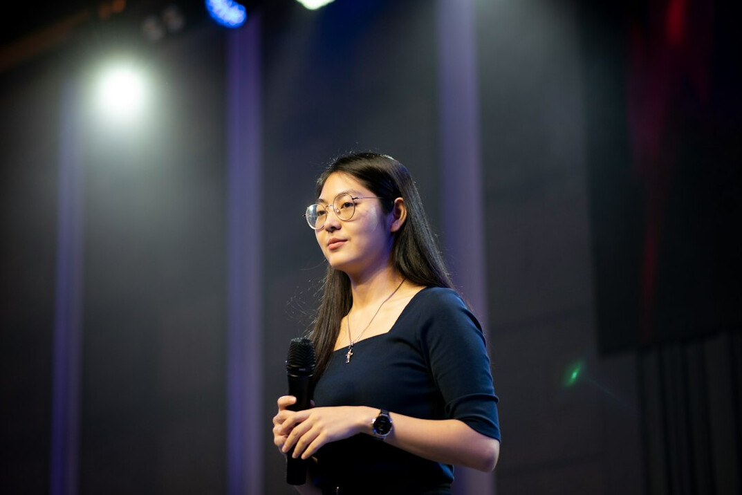 confident speaker presenting ideas