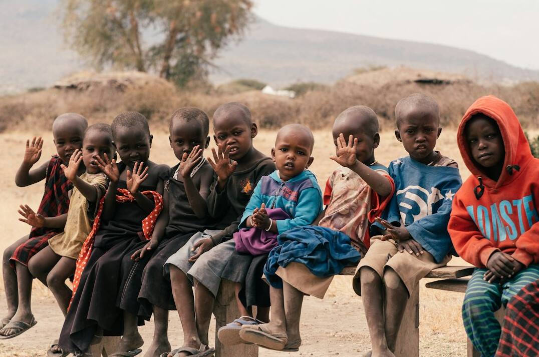 Small group sitting together listening attentively